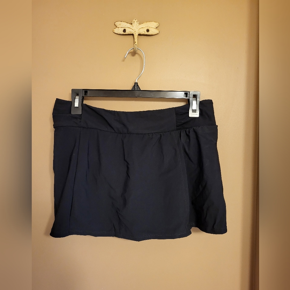 Christina. Swimskirt NWOT. Black. Size 10.